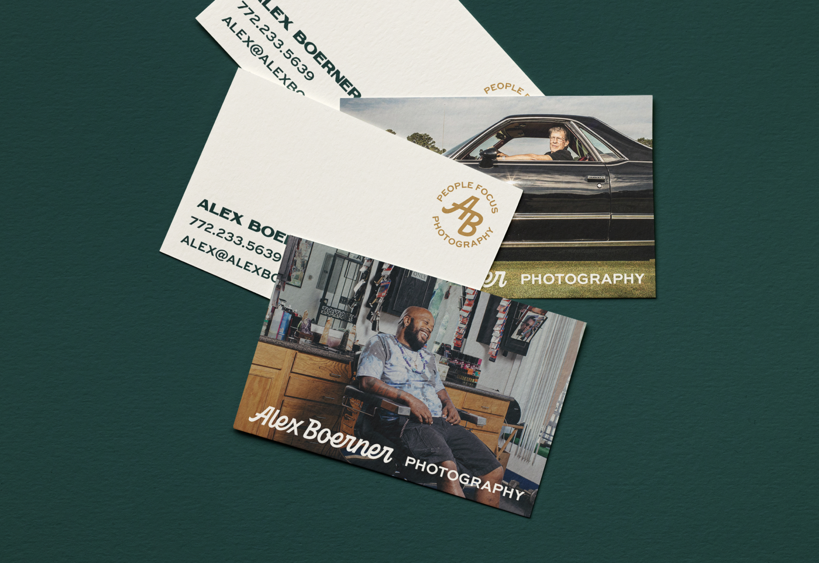 Business cards scattered on a table Alex Boerner Photography | Custom Lettered Logotype