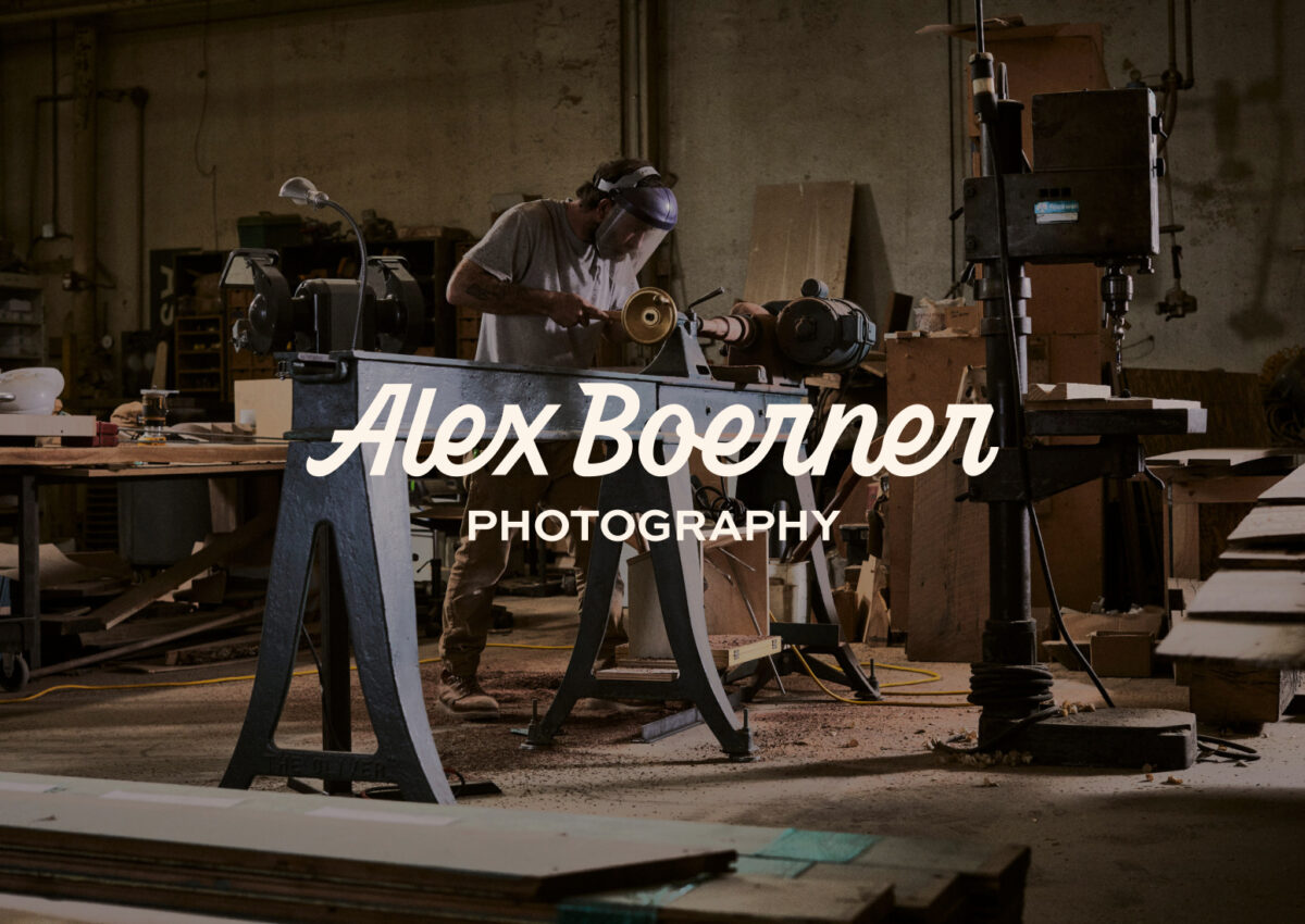 Logo overlaid on top of a photograph of Raleigh Reclaimed Alex Boerner Photography | Custom Lettered Logotype