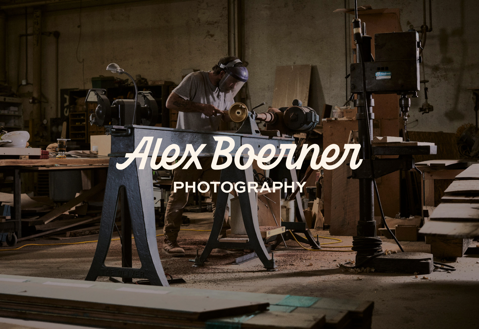 Logo overlaid on top of a photograph of Raleigh Reclaimed Alex Boerner Photography | Custom Lettered Logotype